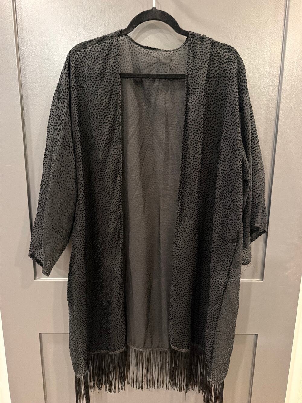 sheer, open-front black kimono cardigan featuring a subtle geometric dots